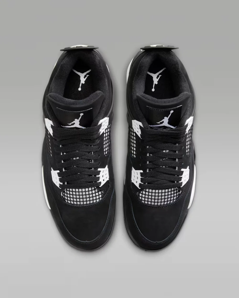 Air Jordan 4 Retro White Thunder Air Jordan 4 Retro White Thunder black nubuck sneaker with white accents