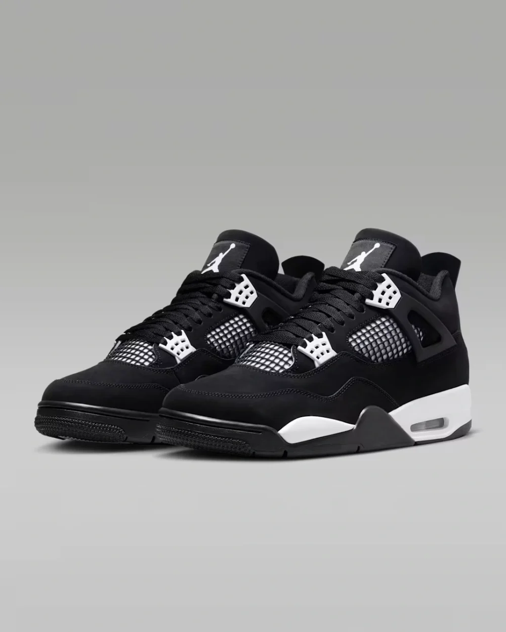 Air Jordan 4 Retro White Thunder Air Jordan 4 Retro White Thunder black nubuck sneaker with white accents