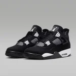 Air Jordan 4 Retro White Thunder black nubuck sneaker with white accents