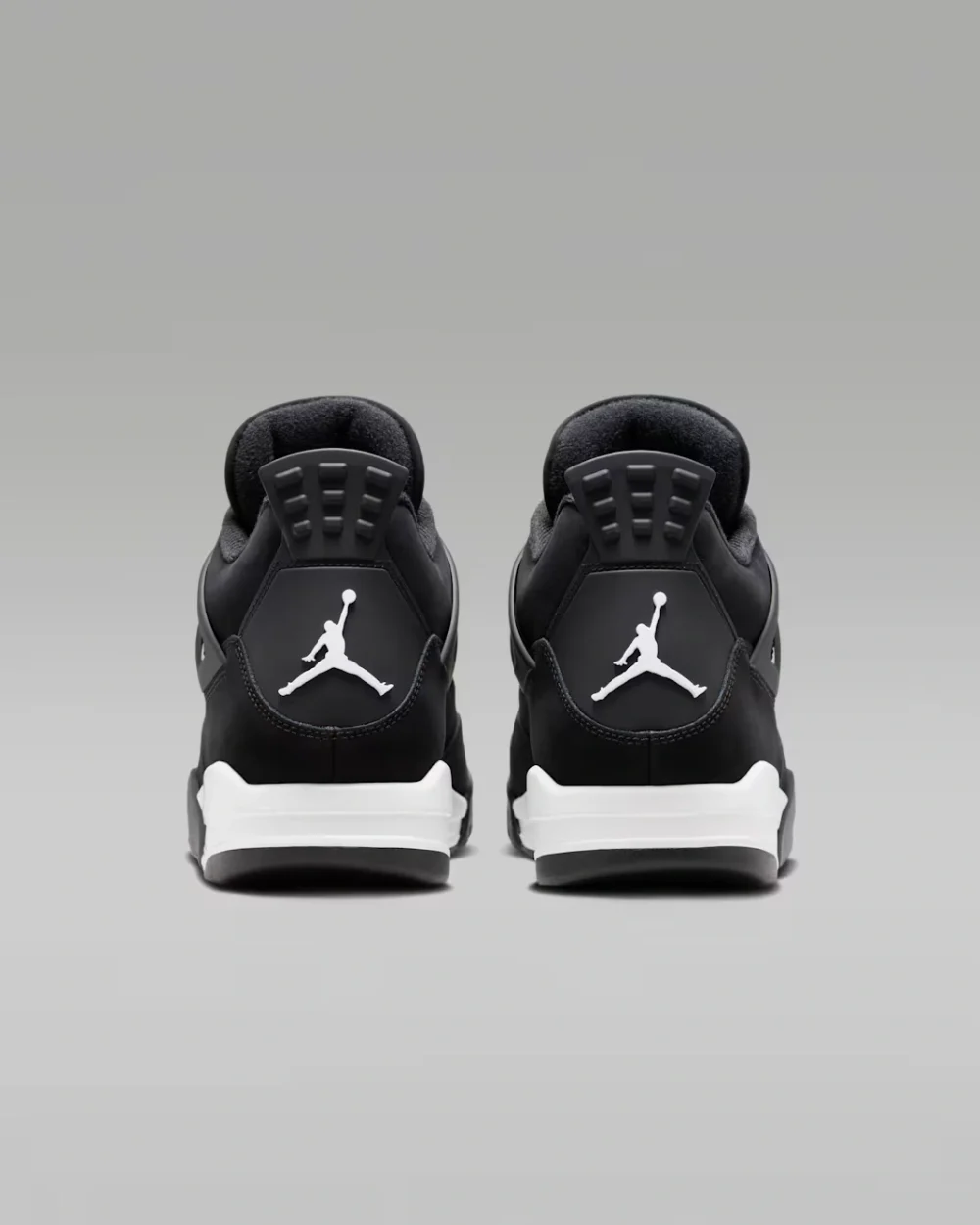 Air Jordan 4 Retro White Thunder Air Jordan 4 Retro White Thunder black nubuck sneaker with white accents